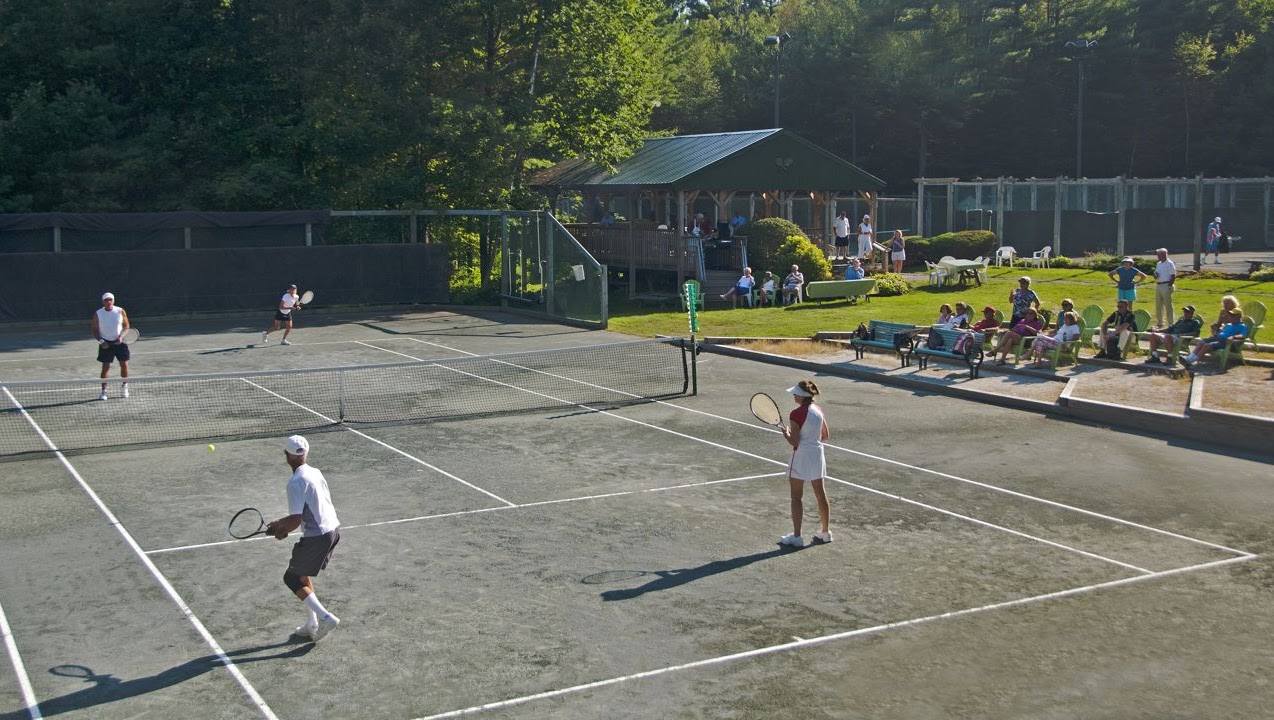 Tennis match in progress at Wolfeboro Tennis Club